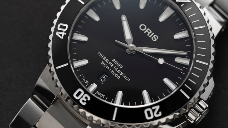 Aquis Date - 01 733 7789 4154-07 8 23 04PEB | Oris